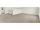 Spacious living area with neutral carpet, bright walls, and a staircase, perfect for relaxing or entertaining at 2750 Glade Ave, Plainfield, IN 46168