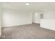 Bright living room features neutral carpet, recessed lighting, and an open layout, creating an inviting atmosphere at 2750 Glade Ave, Plainfield, IN 46168