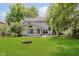 Well-maintained backyard featuring a patio and lush lawn at 2916 Sunmeadow Way, Indianapolis, IN 46228