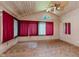 Cozy sunroom features tile flooring and windows, creating a relaxing space with natural light at 2916 Sunmeadow Way, Indianapolis, IN 46228