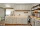 Kitchen with butcher block countertops, stainless steel appliances, gray cabinets, and wood laminate flooring at 311 Northshore Blvd, Anderson, IN 46011