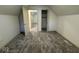 Attic bedroom with closet and new carpet, showcasing the space of the room at 317 W Pierson St, Greenfield, IN 46140