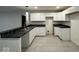 Modern kitchen with ample countertop space, clean lines, bright lighting, and white cabinetry at 317 W Pierson St, Greenfield, IN 46140