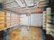 Unfinished basement with shelving offering potential for customization and extra storage space at 3615 N Dequincy St, Indianapolis, IN 46218