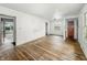 Living room with wood floors and white walls at 3615 N Dequincy St, Indianapolis, IN 46218