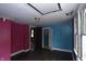 Attic bedroom featuring two-toned walls and hardwood floors at 364 S Cole St, Indianapolis, IN 46241