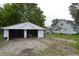 View of the detached garage and the back of the house at 364 S Cole St, Indianapolis, IN 46241