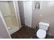 Full bathroom with a stand-up shower and toilet, showcasing the home's practical layout at 364 S Cole St, Indianapolis, IN 46241