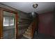 Cozy entryway featuring a staircase and view into dining room at 364 S Cole St, Indianapolis, IN 46241