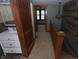 View of an upstairs hallway with a sink and vanity, stairs, and a bedroom at 364 S Cole St, Indianapolis, IN 46241
