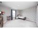 Cozy bedroom featuring neutral walls, patterned accent wall, and ample natural light at 3667 Gilmore Pl, Bargersville, IN 46106