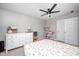 Cozy bedroom with large dresser, comfortable bed, ceiling fan and neutral carpet at 3667 Gilmore Pl, Bargersville, IN 46106
