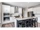 Stylish kitchen with stainless steel appliances, white cabinets, kitchen island, and subway tile backsplash at 3667 Gilmore Pl, Bargersville, IN 46106
