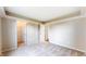 Bedroom featuring neutral walls, carpet, and access to closet and adjoining room at 3959 Towhees Dr, Indianapolis, IN 46237