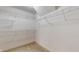 Walk-in closet with installed shelving for optimal storage solutions at 3959 Towhees Dr, Indianapolis, IN 46237