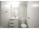 Clean bathroom with a white vanity, toilet, and a mirror at 3965 N Meridian St # 3J West, Indianapolis, IN 46208
