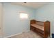 Small bedroom with blue walls, one window and light carpet at 4195 Locust Ln, Brownsburg, IN 46112