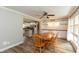 Open-concept dining area with modern lighting fixtures and view to the kitchen, perfect for entertaining at 4195 Locust Ln, Brownsburg, IN 46112