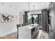 Bright modern kitchen with quartz counters, island with seating and stainless appliances at 420 Monon Wy Dr, Carmel, IN 46032