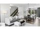 Inviting living area flowing into the kitchen, creating a warm and connected space at 420 Monon Wy Dr, Carmel, IN 46032