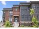Townhouse featuring manicured landscaping, steps and modern curb appeal at 420 Monon Wy Dr, Carmel, IN 46032