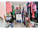 Organized walk-in closet with ample storage and visible shelving for clothes and accessories at 430 N Park Ave # 211, Indianapolis, IN 46202