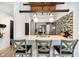 Well-equipped kitchen with breakfast bar, stainless appliances, and pendant lights at 430 N Park Ave # 211, Indianapolis, IN 46202
