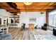 Spacious living area featuring dining area, kitchen, and exercise equipment at 430 N Park Ave # 211, Indianapolis, IN 46202