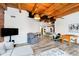 Open concept living space with dining area, kitchen, and exercise equipment at 430 N Park Ave # 211, Indianapolis, IN 46202