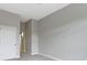 Bedroom featuring plush carpet, neutral walls, and large closet at 450 E Ohio St # Apt 305, Indianapolis, IN 46204