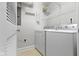 White laundry room with washer and dryer at 450 E Ohio St # Apt 305, Indianapolis, IN 46204