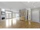 Spacious living room with hardwood floors, fireplace, and lots of natural light at 450 E Ohio St # Apt 305, Indianapolis, IN 46204