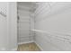 Spacious walk-in closet with multiple levels of shelving, providing ample storage and organization options at 450 E Ohio St # Apt 305, Indianapolis, IN 46204