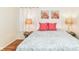 Cozy bedroom featuring a comfortable bed, patterned bedding, and soft natural light at 4751 Payton Ave, Lawrence, IN 46226