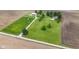 Wide aerial view of a property with a two-story home, barn, and vast green fields at 4817 N 150 W, Anderson, IN 46011