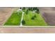 Expansive acreage features a two-story home, barn, lush green lawn, and surrounding farm land at 4817 N 150 W, Anderson, IN 46011