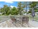 The spacious back deck features a patio table with umbrella and ample room for outdoor entertaining at 4817 N 150 W, Anderson, IN 46011