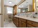 Bathroom featuring double sinks, lots of counter space, great lighting, and lots of storage space at 4817 N 150 W, Anderson, IN 46011