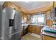 Practical kitchen featuring stainless steel appliances, wood cabinets, and efficient design at 4817 N 150 W, Anderson, IN 46011