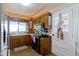 Functional kitchen featuring wood cabinets and essential appliances at 4817 N 150 W, Anderson, IN 46011