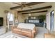 Cozy living room showcases beamed ceilings and a comfortable sofa at 4817 N 150 W, Anderson, IN 46011