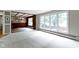 Spacious living room leads into a dining room and features a large window at 4817 N 150 W, Anderson, IN 46011