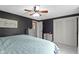 Main bedroom with carpeted floors, dark walls and white trim, and light colored furnishings at 4817 N 150 W, Anderson, IN 46011