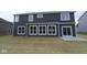 Exterior features a spacious backyard with a sliding door and large windows for natural light at 4947 Amber Crest Dr, Brownsburg, IN 46112