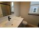 Modern bathroom features a sleek vanity with a white countertop and contemporary black faucet at 4947 Amber Crest Dr, Brownsburg, IN 46112