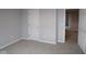 Bedroom featuring neutral carpet, gray walls, and white doors at 4947 Amber Crest Dr, Brownsburg, IN 46112