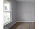 A sunny bedroom with neutral walls, a large window, and space for furniture, ideal for relaxation and rest at 4947 Amber Crest Dr, Brownsburg, IN 46112