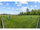 Community dog park with agility equipment and ample space for pets to play at 4947 Amber Crest Dr, Brownsburg, IN 46112