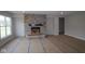 Bright living room showcasing a stone fireplace, perfect for cozy gatherings at 4947 Amber Crest Dr, Brownsburg, IN 46112