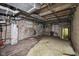 Basement interior with cinder block walls and exposed pipes at 5035 Boulevard Pl, Indianapolis, IN 46208